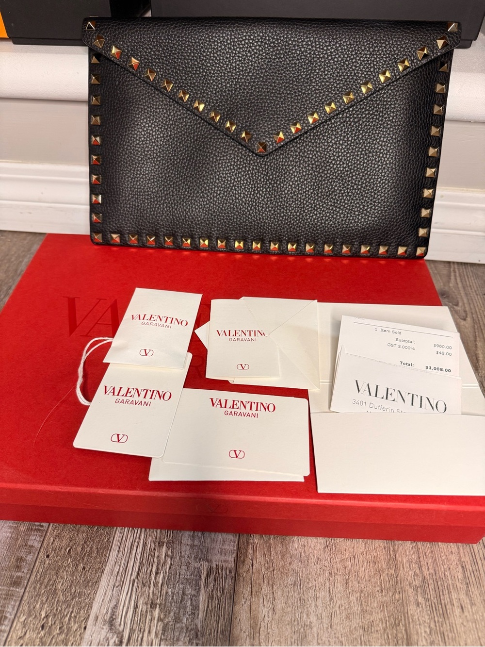 Valentino Black Pebbled Leather Stud Clutch with Gold Accents